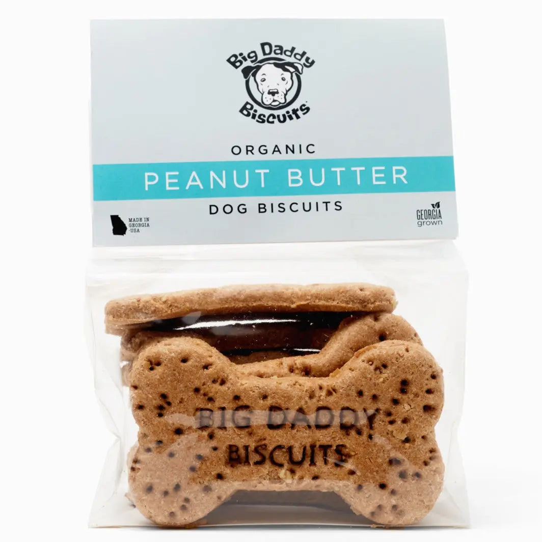 Big Daddy Biscuits organic peanut butter bone-shaped dog treats in packaging.
