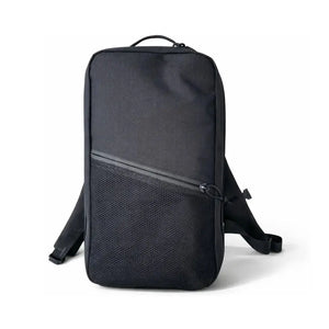 Minimalist black backpack with mesh front pocket and adjustable straps