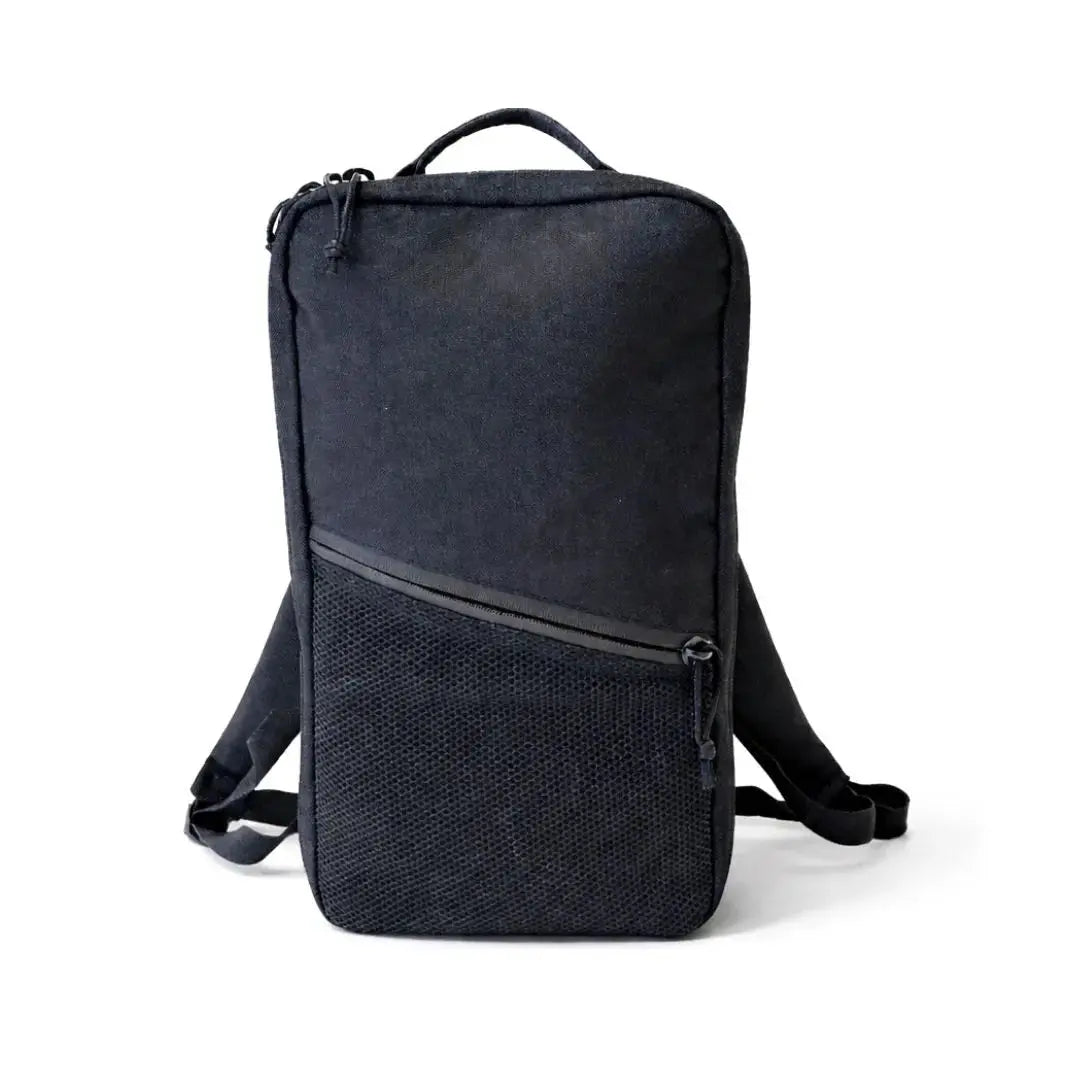 Black minimalist backpack with mesh front pocket and dual straps