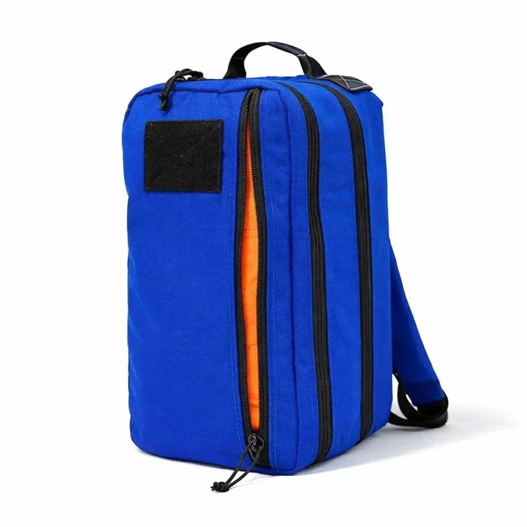 Blue 12 Hour Plus Backpack with orange interior and black patches
