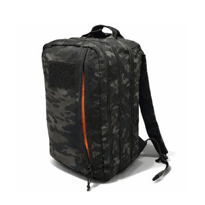 Black and gray camouflage backpack with an orange zipper and Velcro patch.