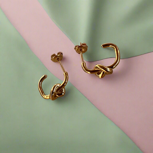 Mini Love Knot Huggies | Gold Vermeil by Ke Bella, additional product image 2