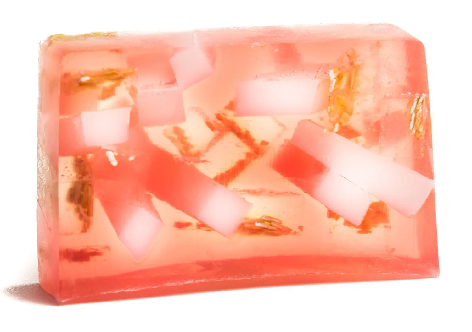 Clear pink soap bar with embedded white pieces and organic oatmeal bits