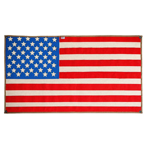 American flag made from recycled fire hose with stars and stripes