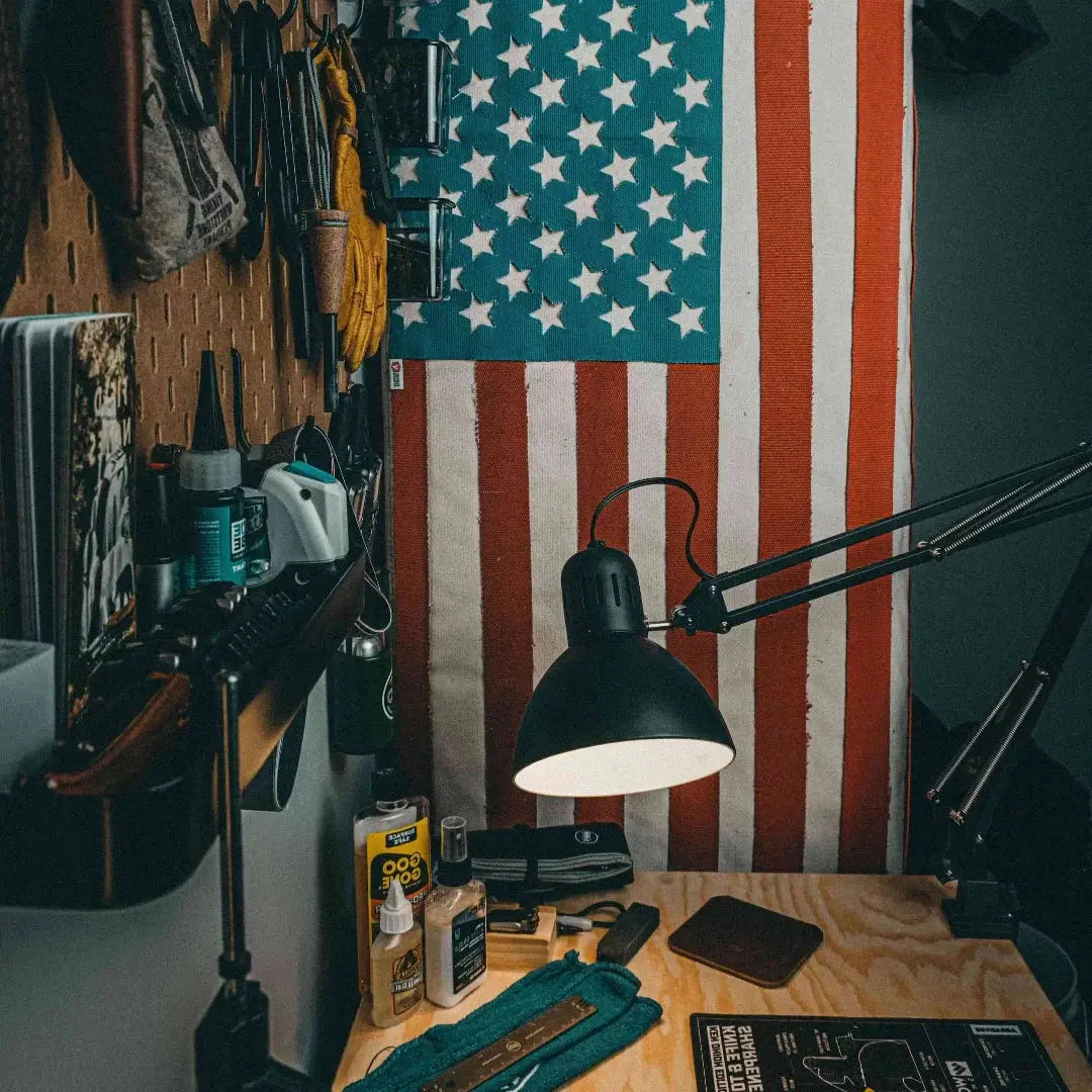 American flag made from recycled red and blue fire hose with white stars.