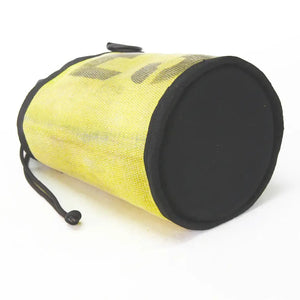 Yellow and black cylindrical ammo bag made from recycled fire hose.