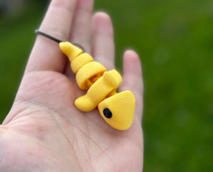 3D Printed Yellow Worm Keychain in Hand | Textured, Mississippi Handmade Animal Accessory