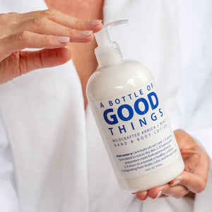 A bottle of "A Bottle of Good Things" Wildcrafted Arnica + Mint Hand & Body Lotion, 16 oz.