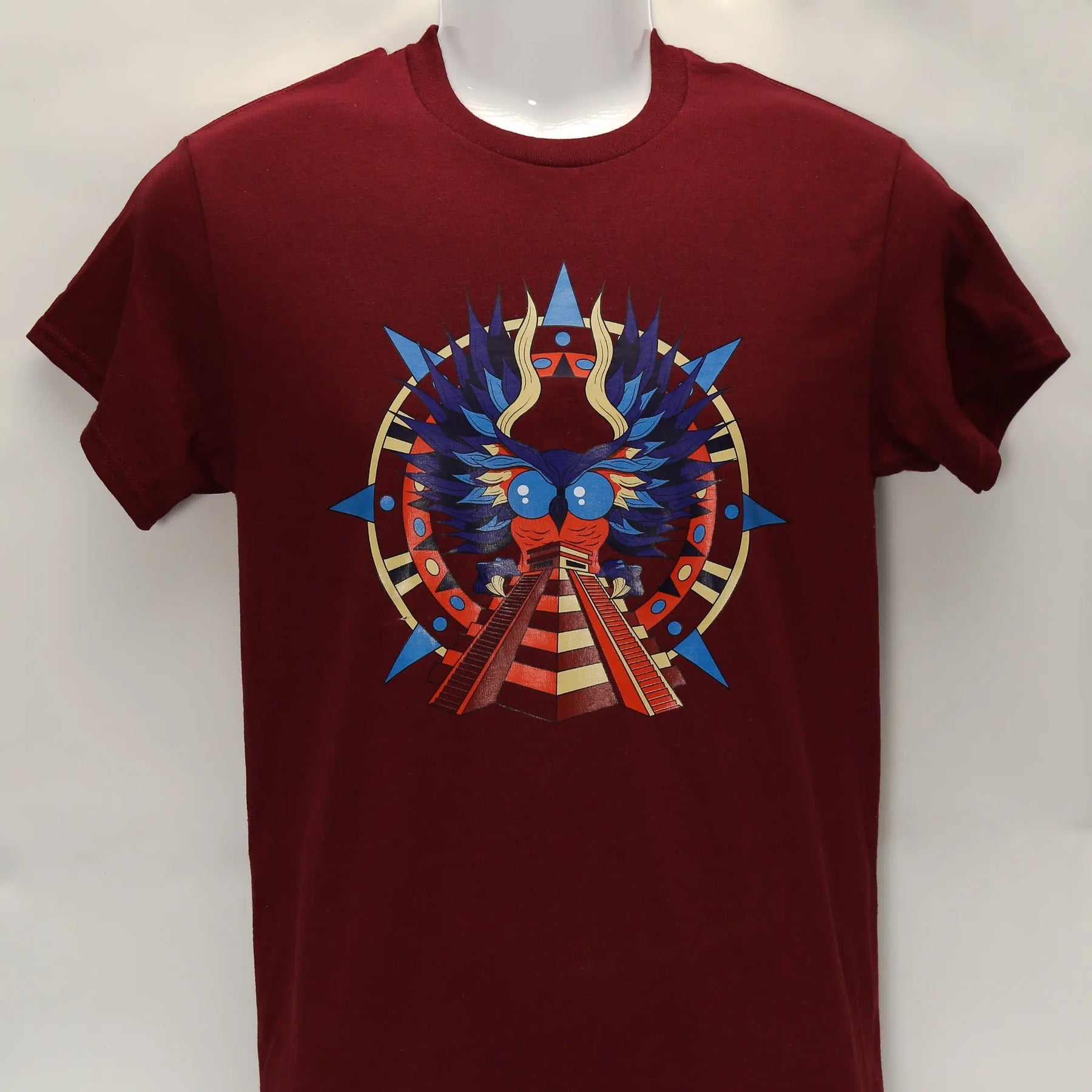 Maroon t-shirt with a colorful graphic of an owl and a pyramid.