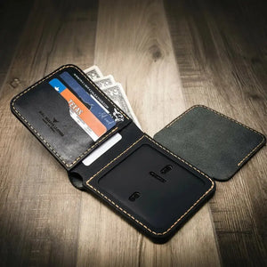Black leather bifold wallet with ID badge holder and card slots.