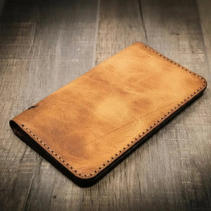 Badge Long Wallet front exterior with hand-finished leather edges