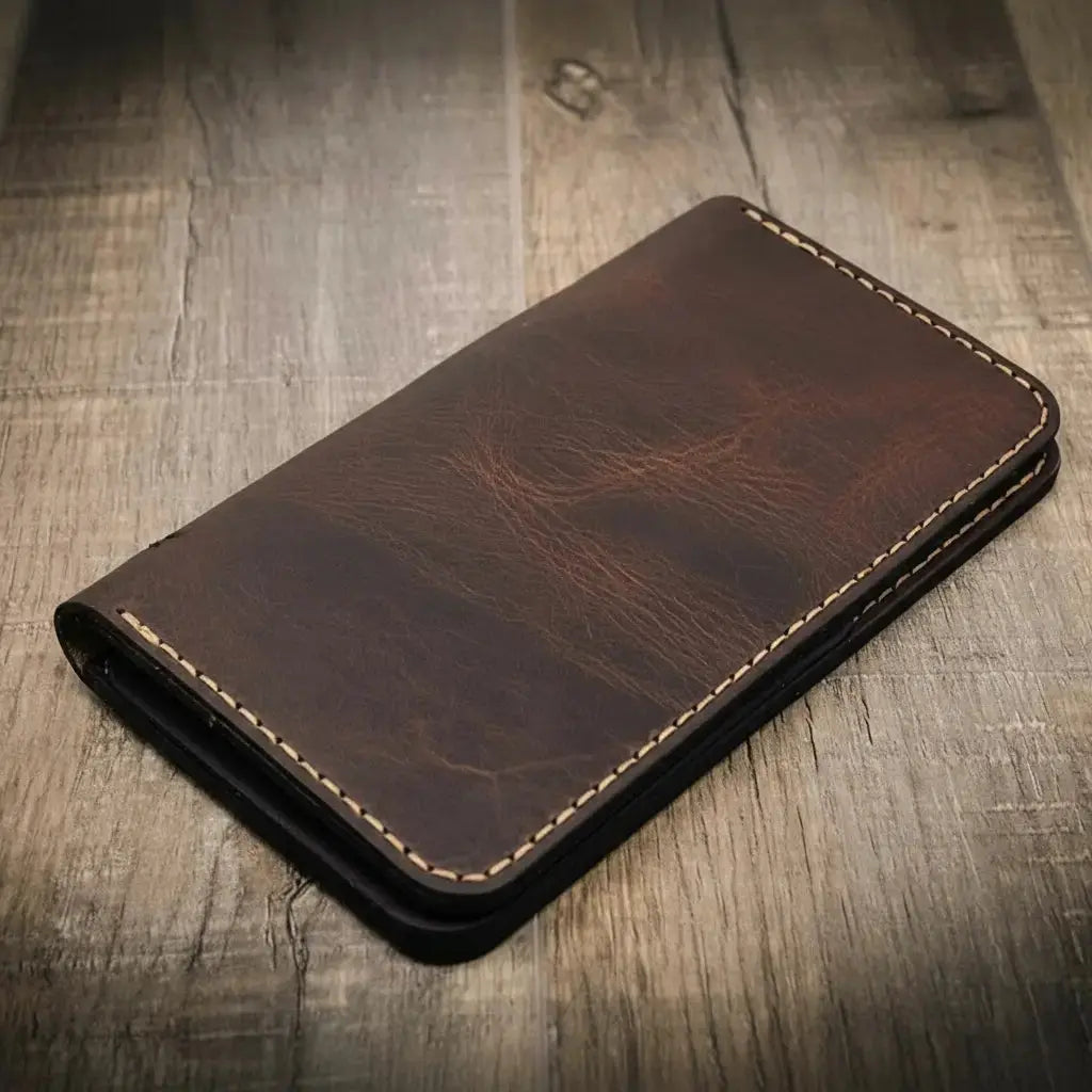 Close view of Badge Long Wallet leather grain and stitching