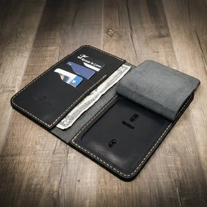 Full-grain leather Badge Long Wallet shown from an angled view
