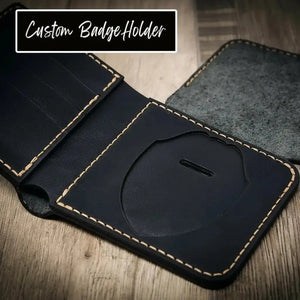 Black leather trifold badge holder with stitched edges and card slots