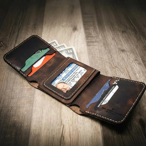 Brown leather trifold wallet with driver's license and cards.