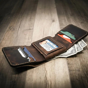 Brown leather trifold wallet with ID, cards, and US dollar bills