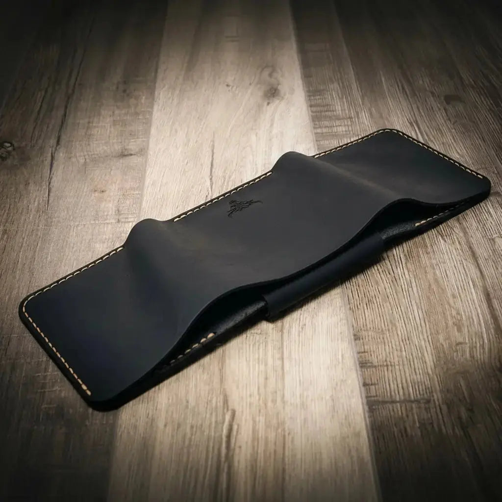 Dark blue leather trifold wallet with embossed logo and contrasting stitching.