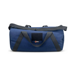 Navy blue 1000D Cordura barrel duffle bag with black straps and a patch.