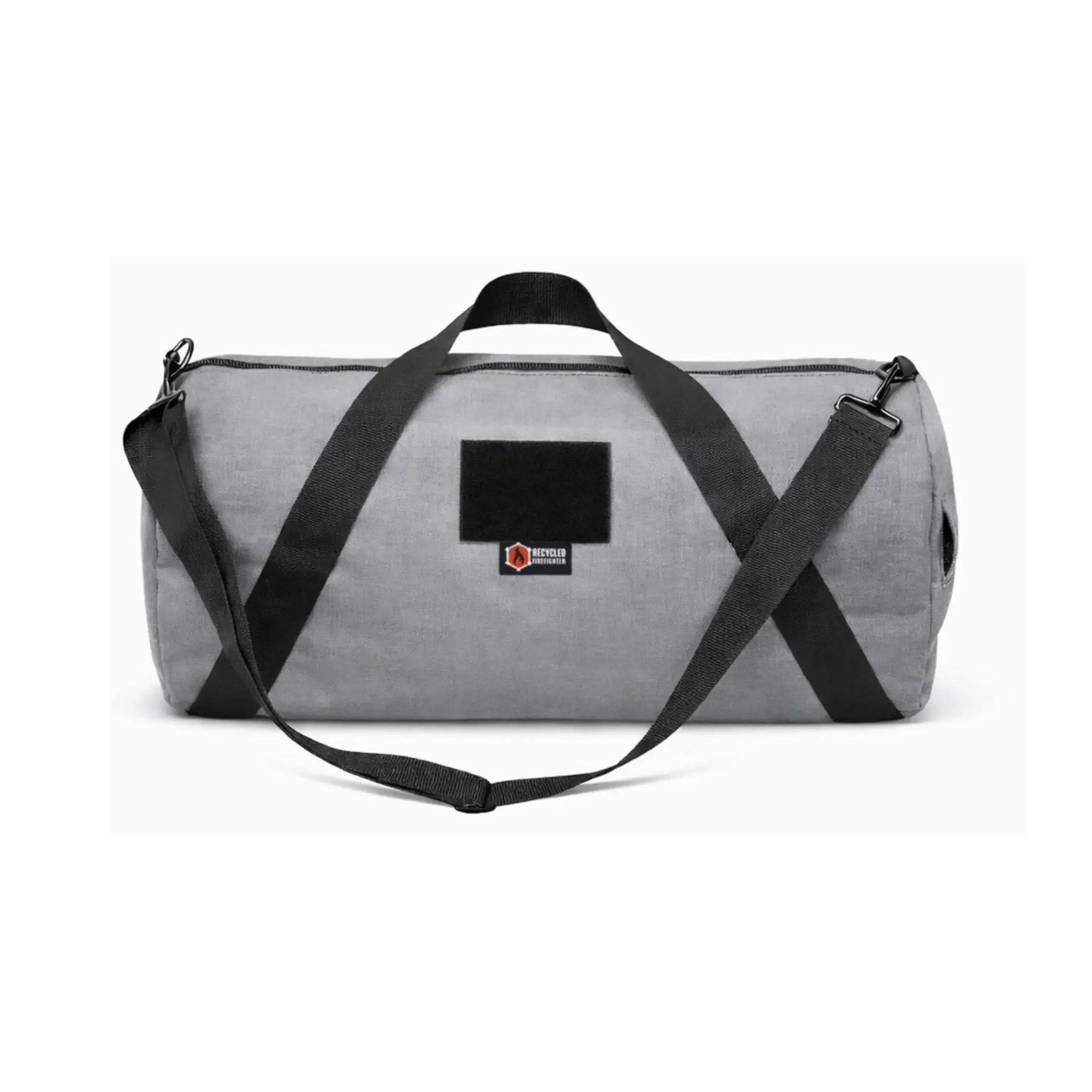 Gray 1000D Cordura barrel duffle bag with black straps and patch.