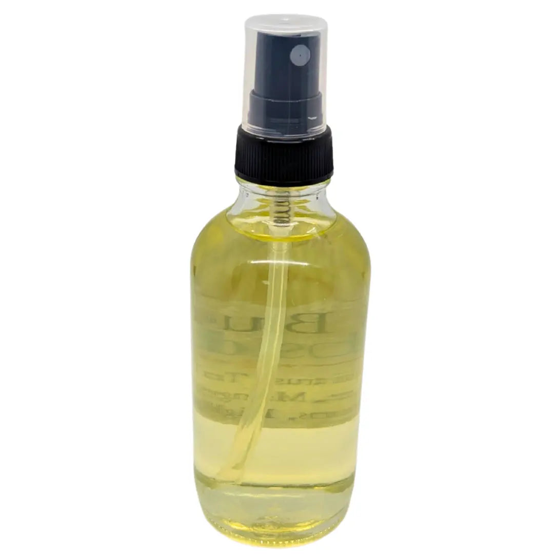 BLUE OBSIDIAN RESILMIST™ ROOM SPRAY in a clear glass bottle with black spray nozzle.