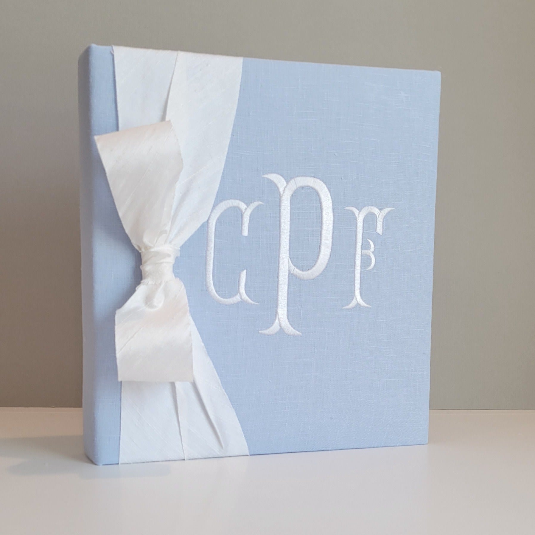 Blue linen handmade baby memory book with silk bow by AP Creations