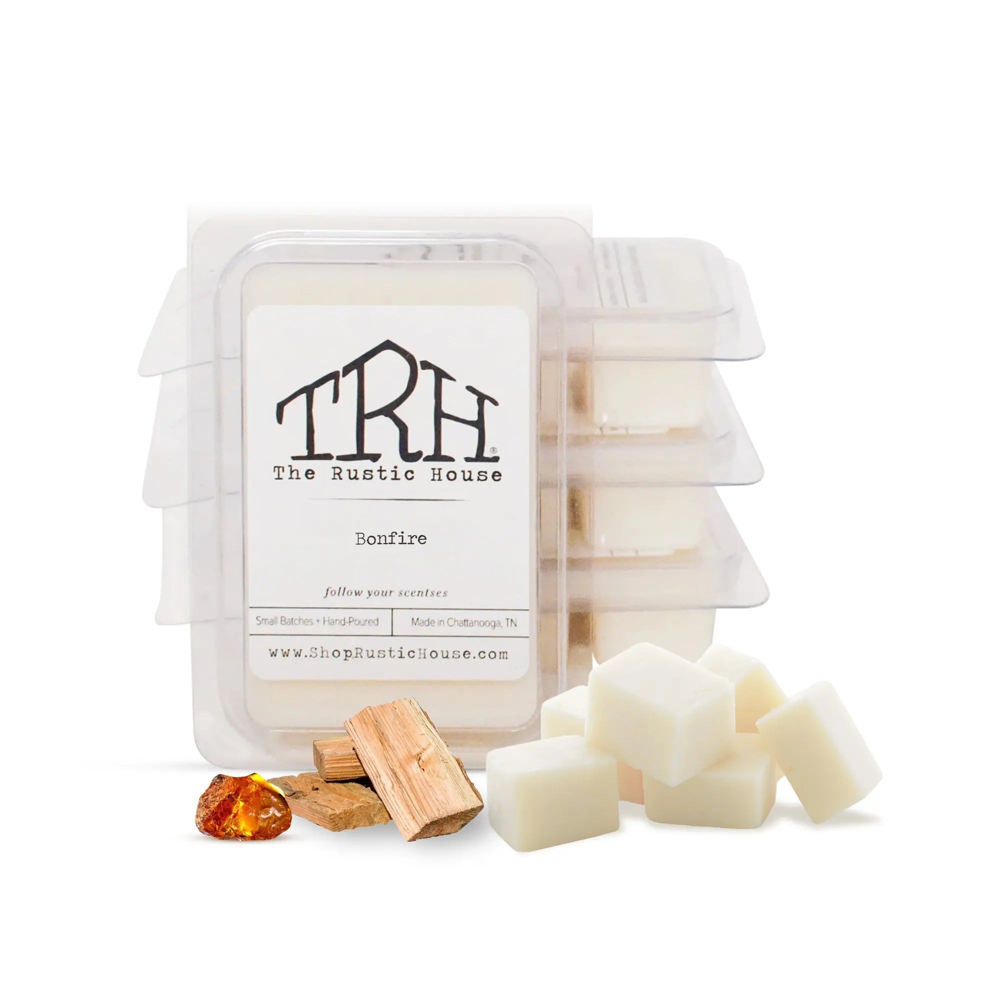 The Rustic House Bonfire wax melt with wood and amber pieces.