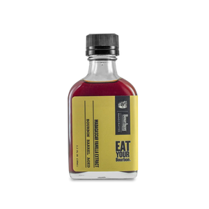 Bourbon Barrel Aged Madagascar Vanilla Extract in a glass bottle with yellow label.
