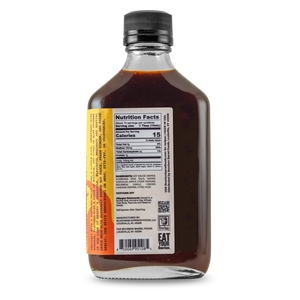 Glass bottle of Bourbon Barrel Foods Hot & Spicy Kentuckyaki sauce with nutrition label.