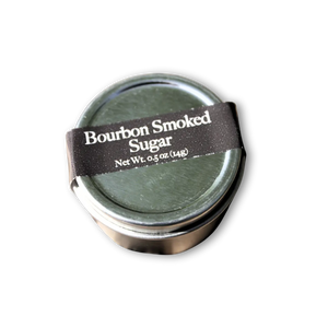 Bourbon Smoked Sugar in a dark green tin with a white label band.