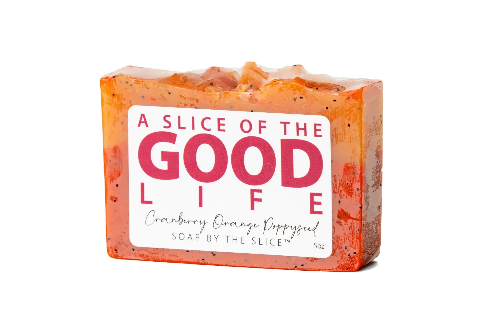 Cranberry orange poppy seed handmade soap slice with exfoliating seeds.