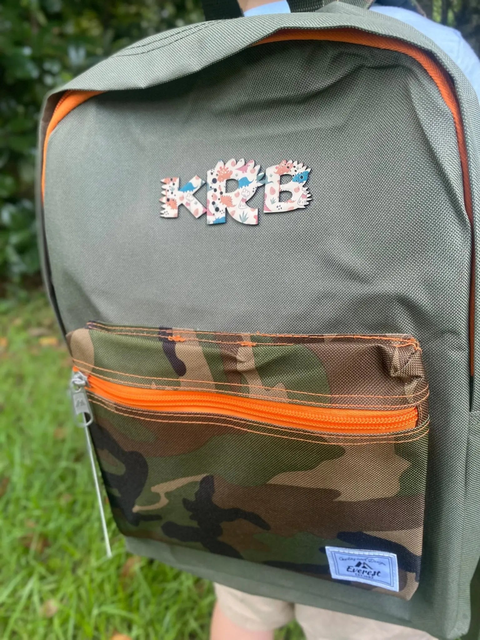Camo Kids Backpack with Custom Dinosaur Initial Patch by Poor Hog Customs, handmade leather goods detail photo 2