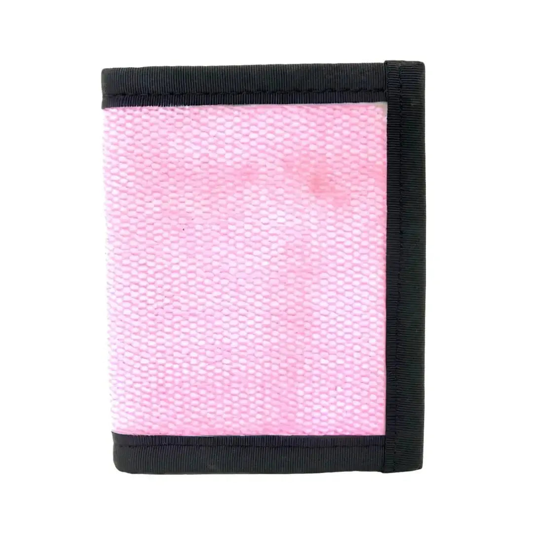 Pink patterned bifold wallet with black trim and stitching