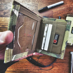 Camouflage bifold wallet with clear ID window and card slots