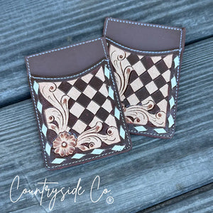 Checkered tooled leather card holder with floral and scrollwork designs
