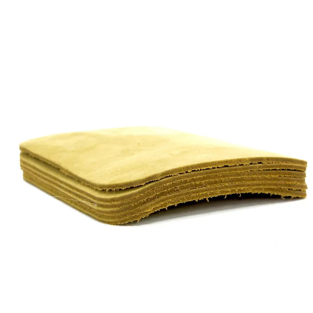Stack of brown leather square coasters