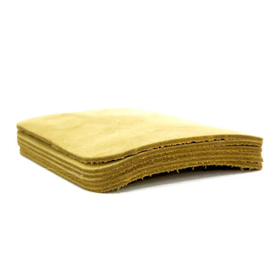 Stack of brown leather square coasters