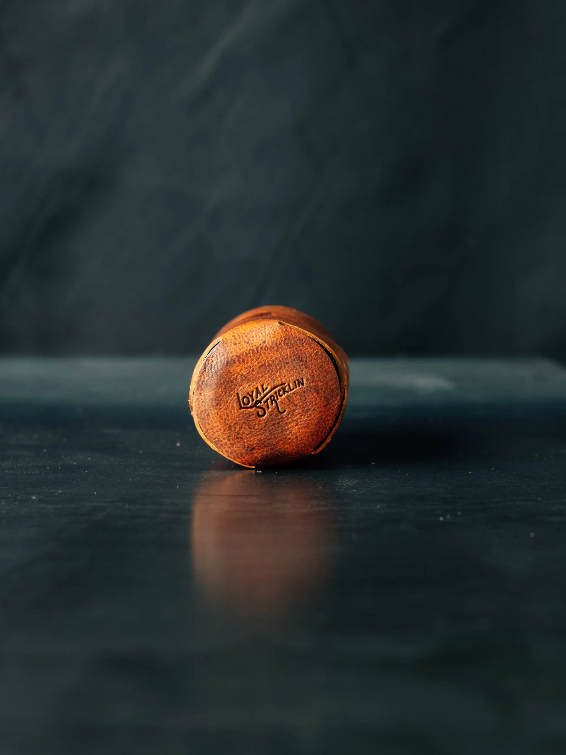 Leather coozie with "LOYAL STRICKLIN" logo, made of Badalassi Carlo Cognac Nemesis leather.