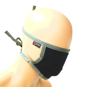 Black cotton face mask with olive green trim and ties, featuring a "Recycled Firefighter" logo.
