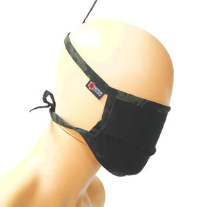 Black cotton face mask with camouflage tie straps on mannequin head