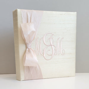 Cream silk handmade baby memory book with silk bow by AP Creations