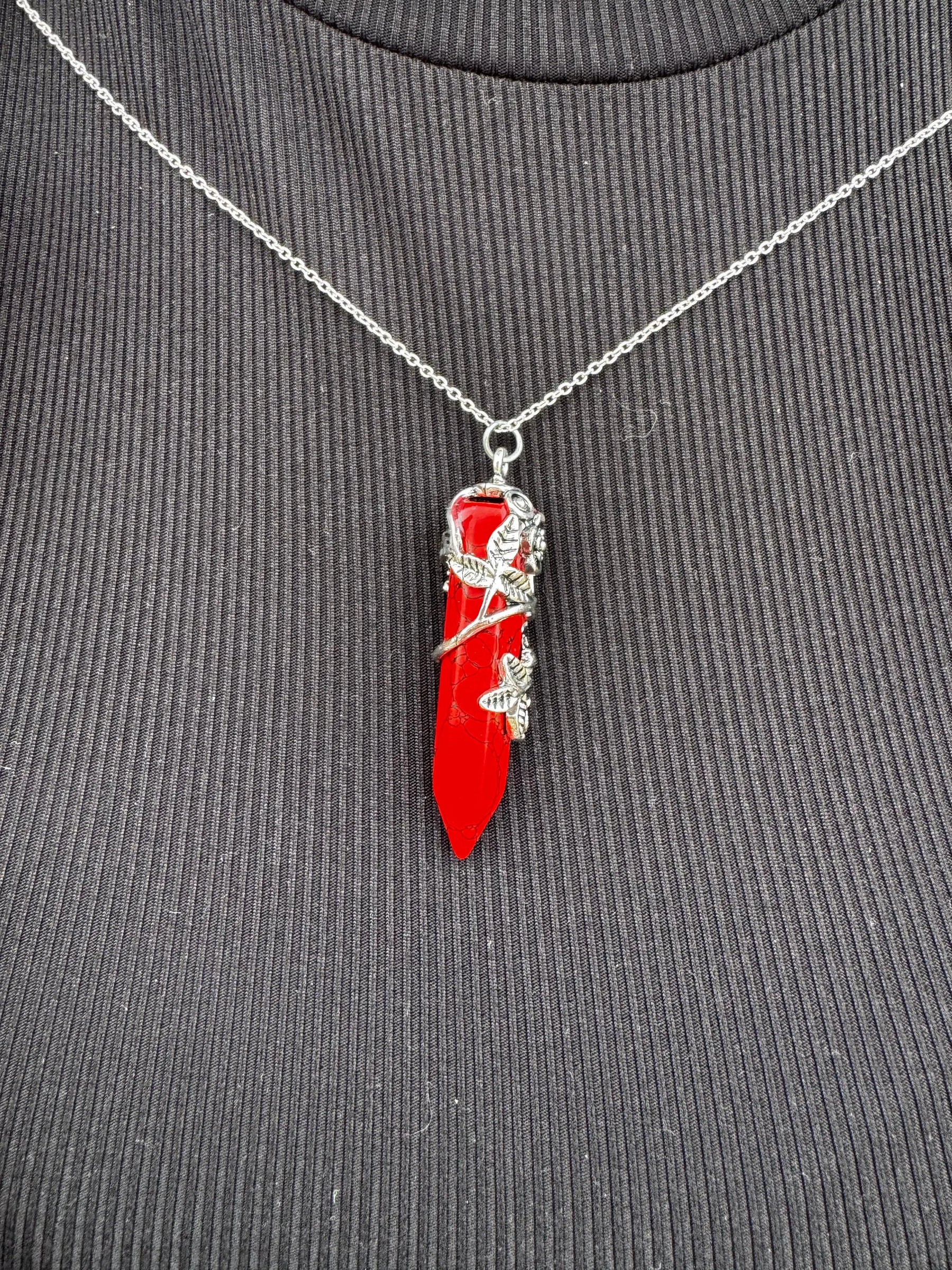 Red crystal necklace with silver leaf vines on a silver chain, Main Street Collective.