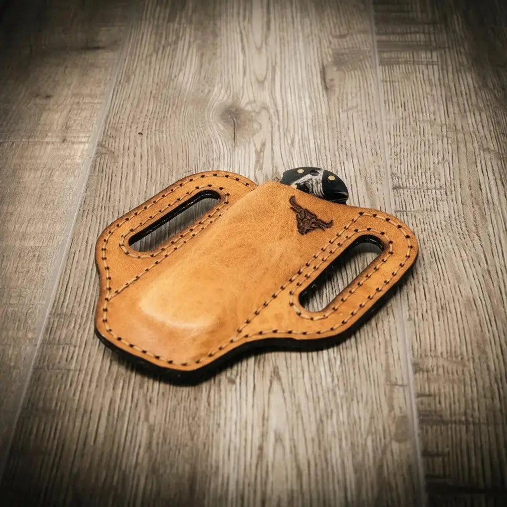 Tan leather trapper knife sheath with belt loops and bull logo