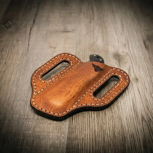 Brown leather trapper knife sheath with belt loops and embossed bull logo