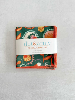 Green cocktail napkins with floral print, set of four.
