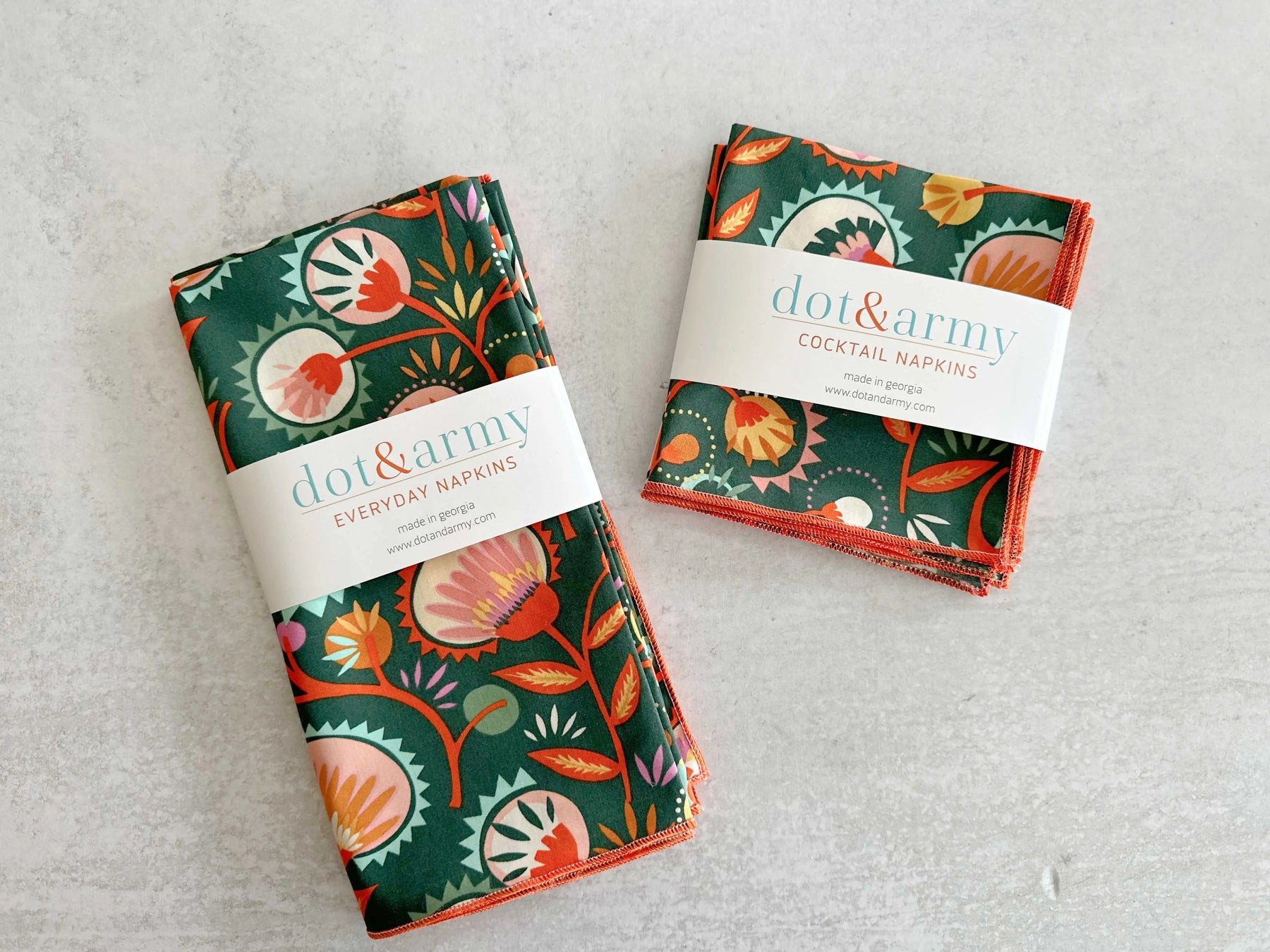 Set of four Dot and Army Desert Bloom cloth napkins with floral pattern.