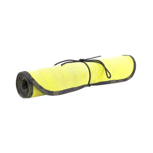 Rolled yellow work mat with black paracord ties