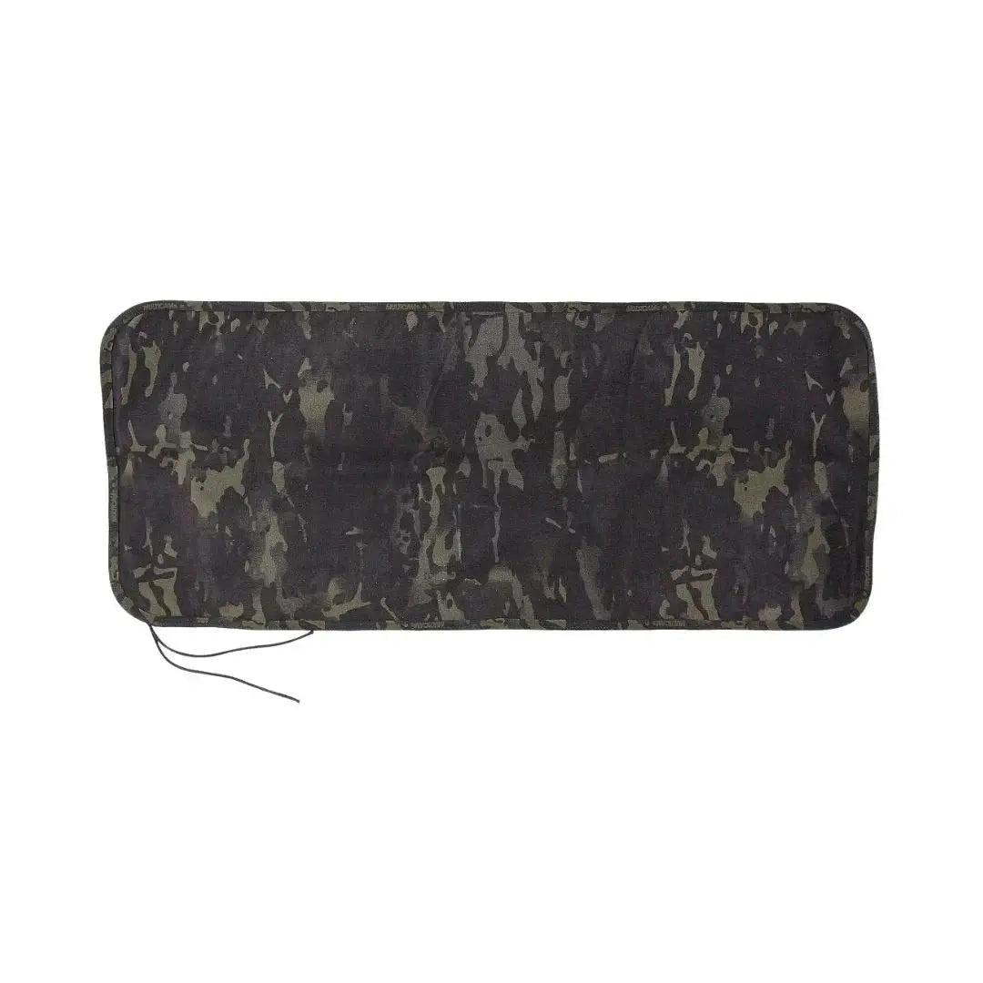 Camouflage drop zone mat with black and green pattern and paracord ties.