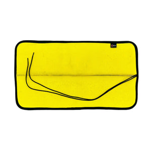 Yellow mat with black binding and paracord loops, made from recycled fire hose.