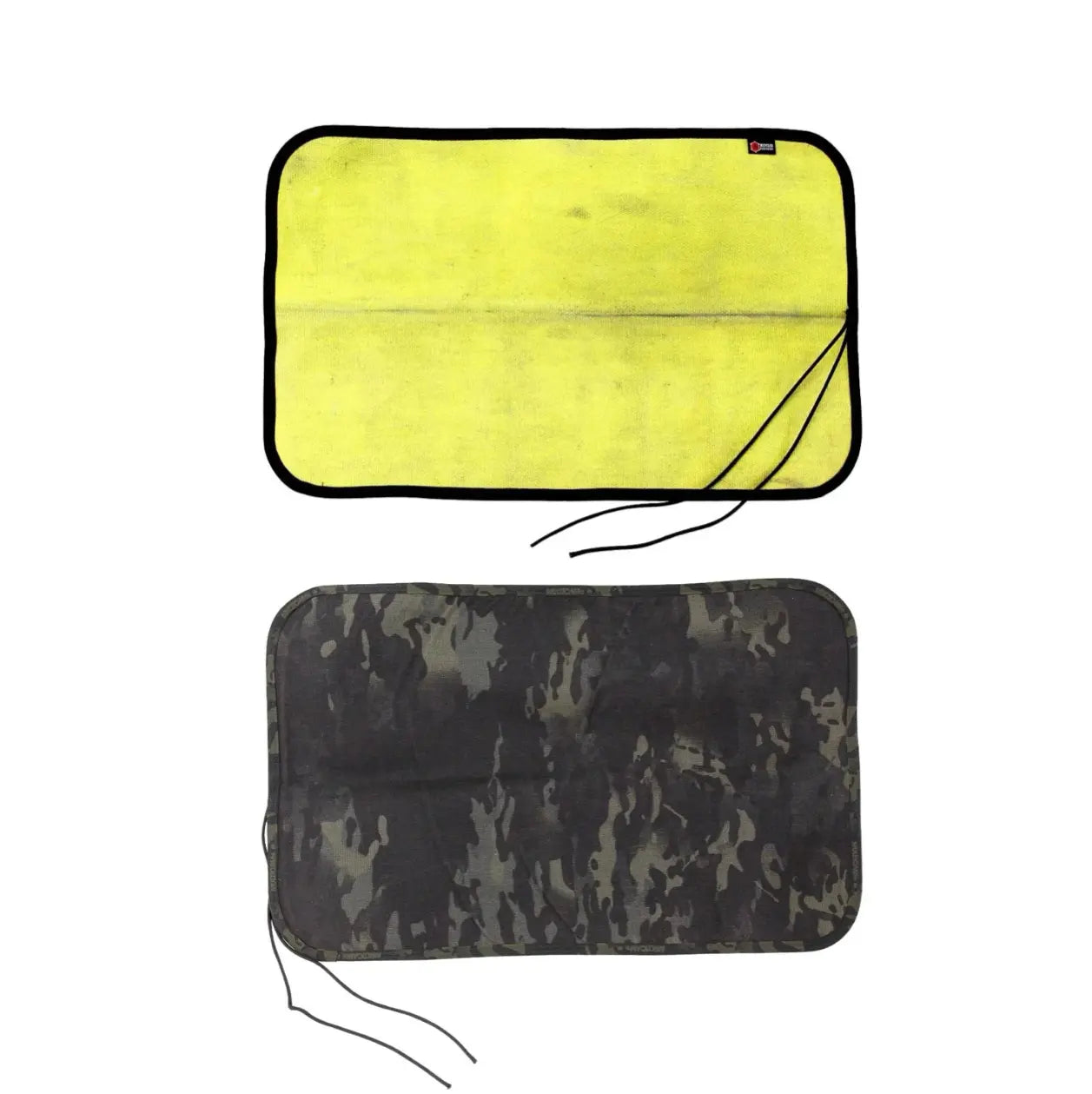 Two drop zone mats, one yellow, one camouflage, with paracord tie loops.