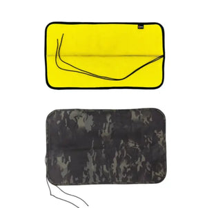 Yellow and camouflage drop zone mats made from fire hose, one rolled with paracord.